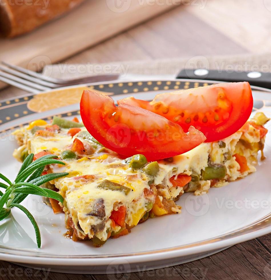 Omelet with vegetables photo