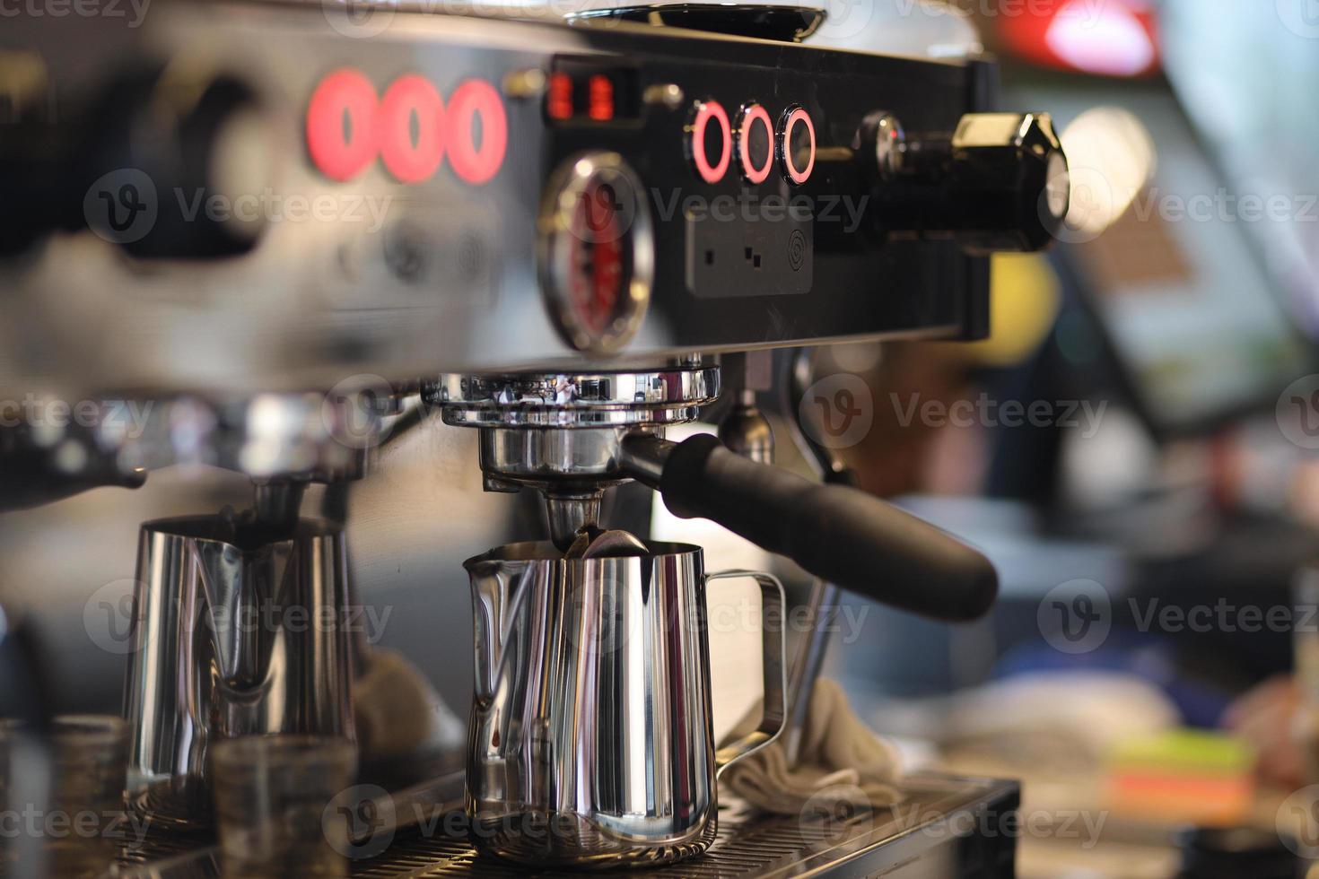Coffee maker machine at coffee shop photo