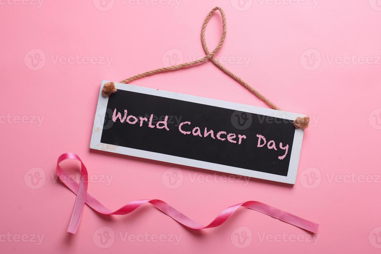 Pink Ribbon For World Cancer Day and Breast Cancer Awarness photo