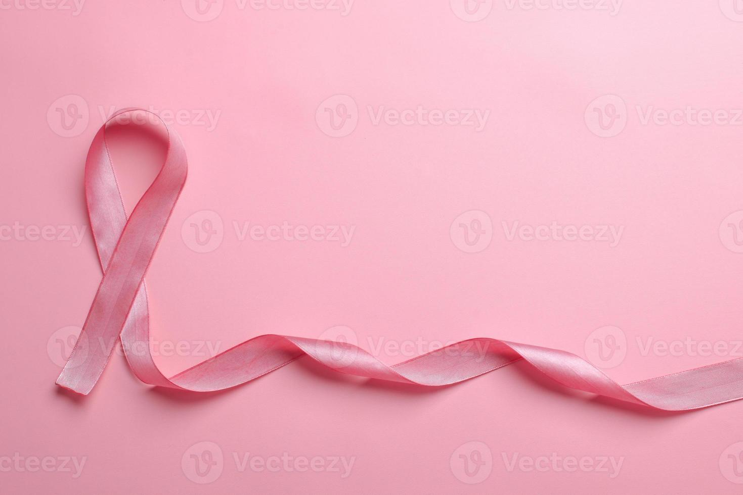 Pink Ribbon For World Cancer Day and Breast Cancer Awarness photo