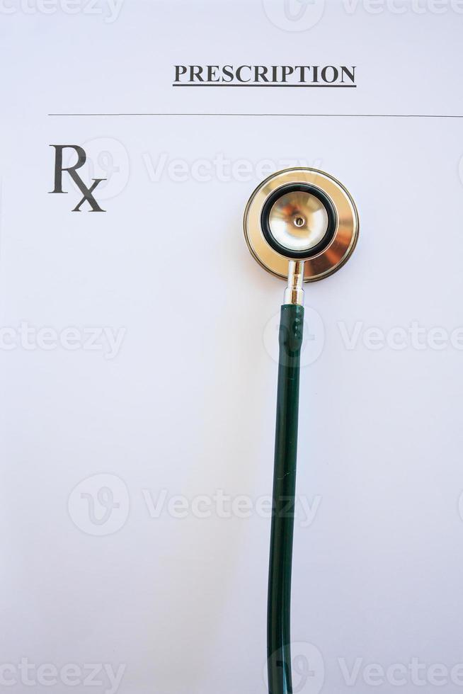 Blank medical prescription with stethoscope photo