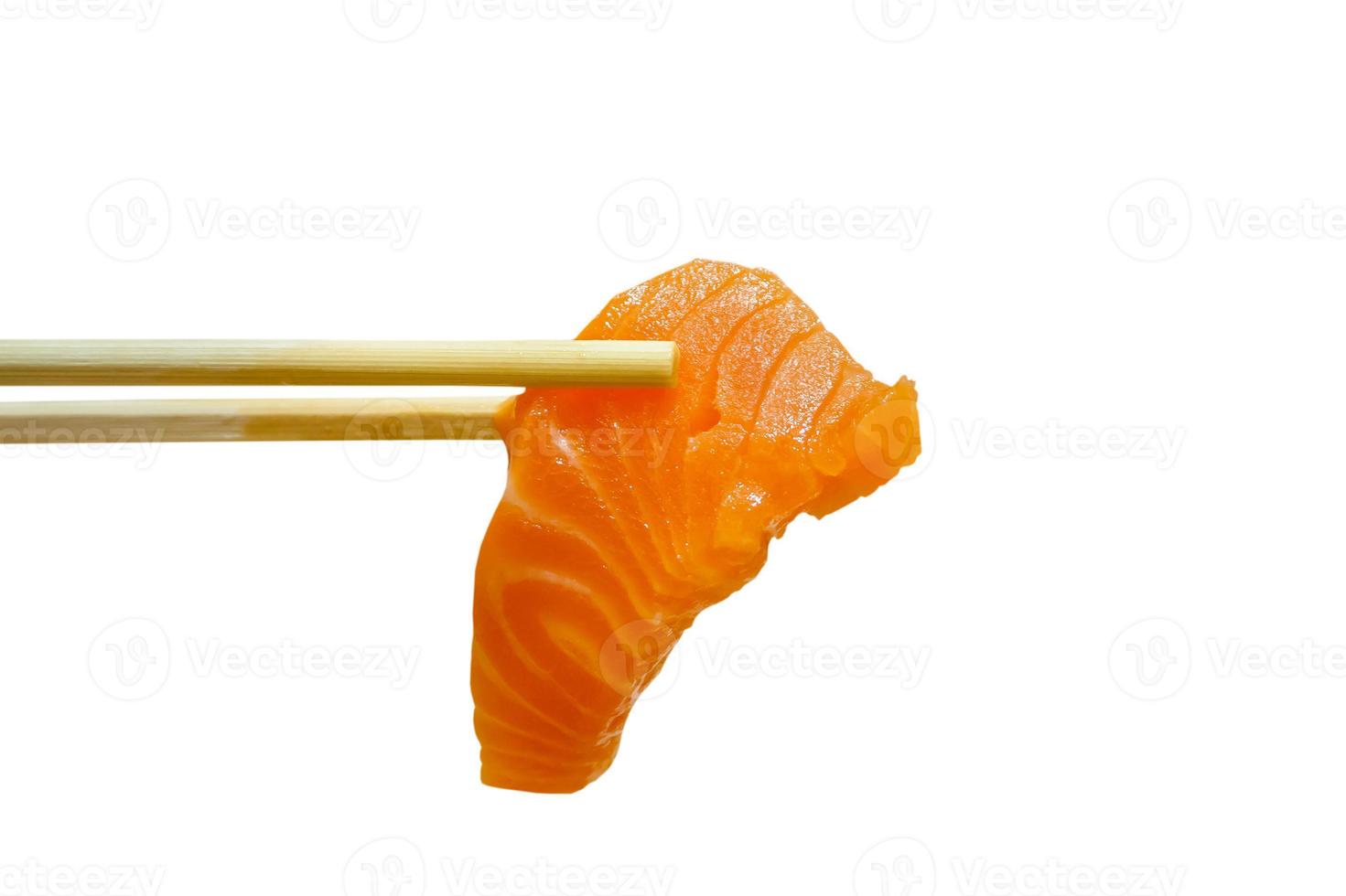 salmon sashimi with chopsticks isolated on white background photo