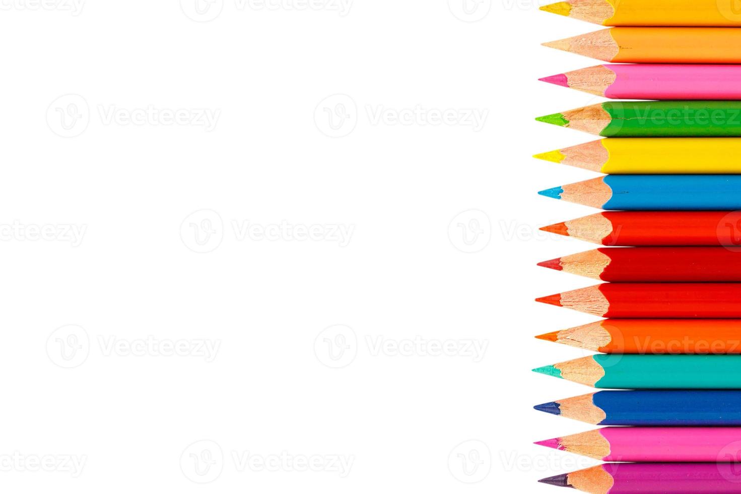 Colour pencils isolated on white background photo
