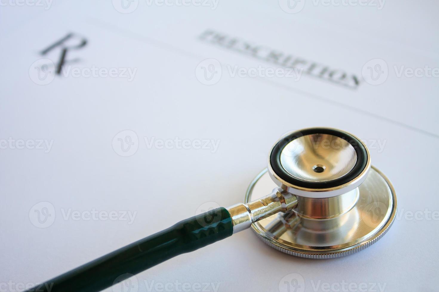 Blank medical prescription with stethoscope photo