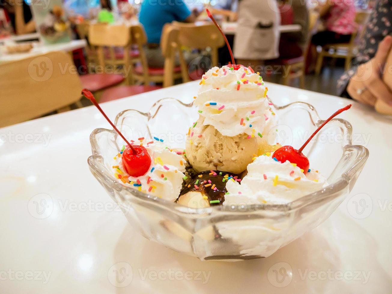 Ice cream scoops with cherry photo