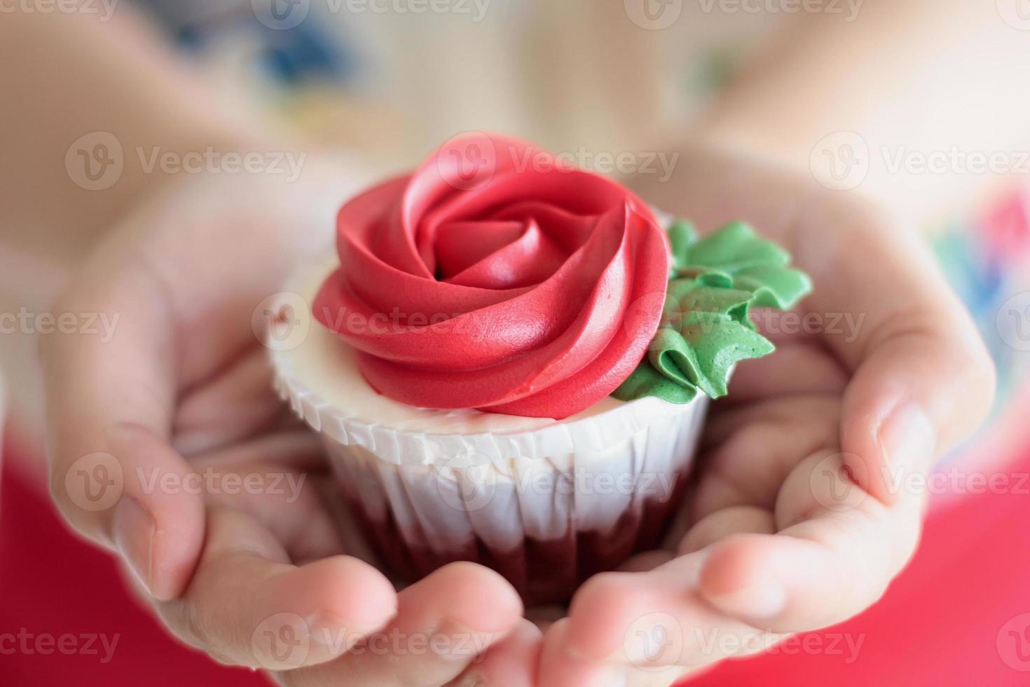 hand hold valentines cupcake photo