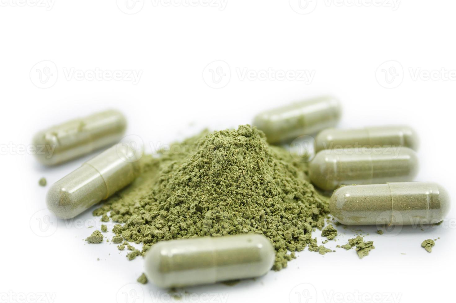 Close up andrographis paniculata herbal antipyretic capsules isolated on white photo