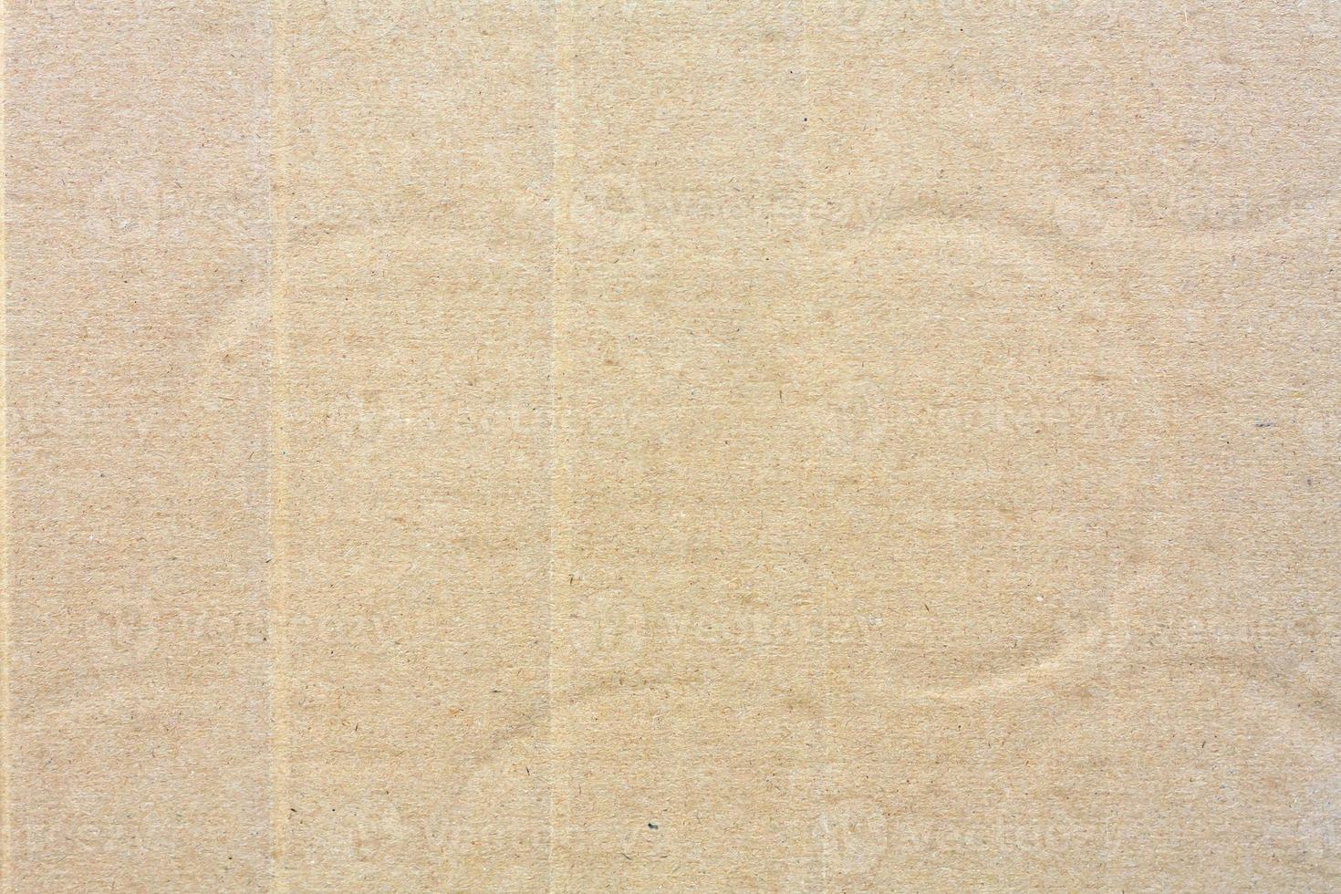 Close up brown cardboard paper background and texture photo