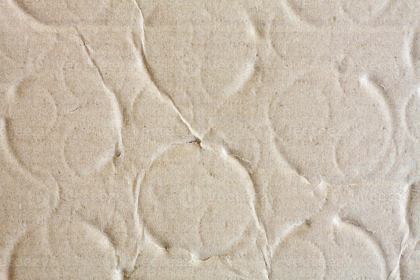 Close up brown cardboard paper background and texture photo
