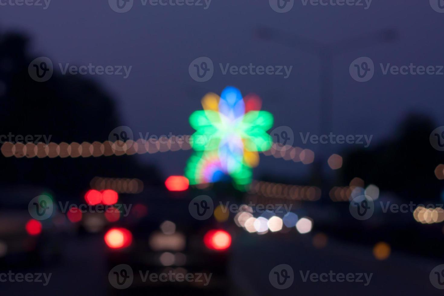 beautiful background of bokeh lights at night on road with car photo