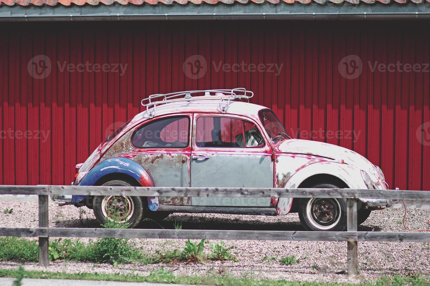 Old retro car in countryside in Europe photo