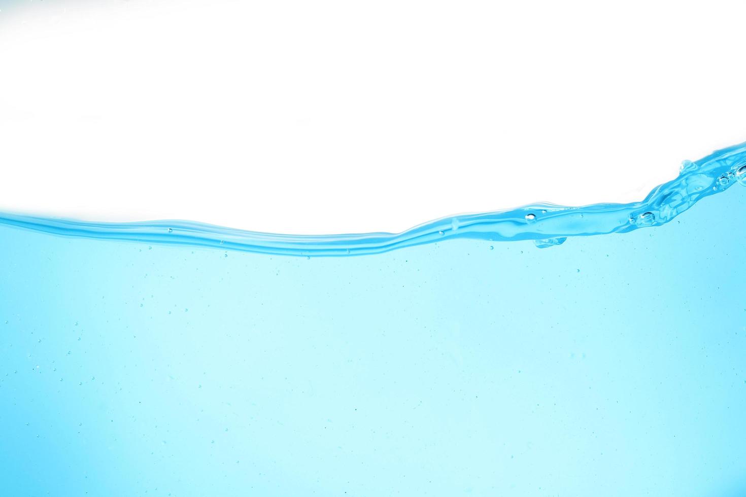 Blue surface water and air bubble isolated on white background photo