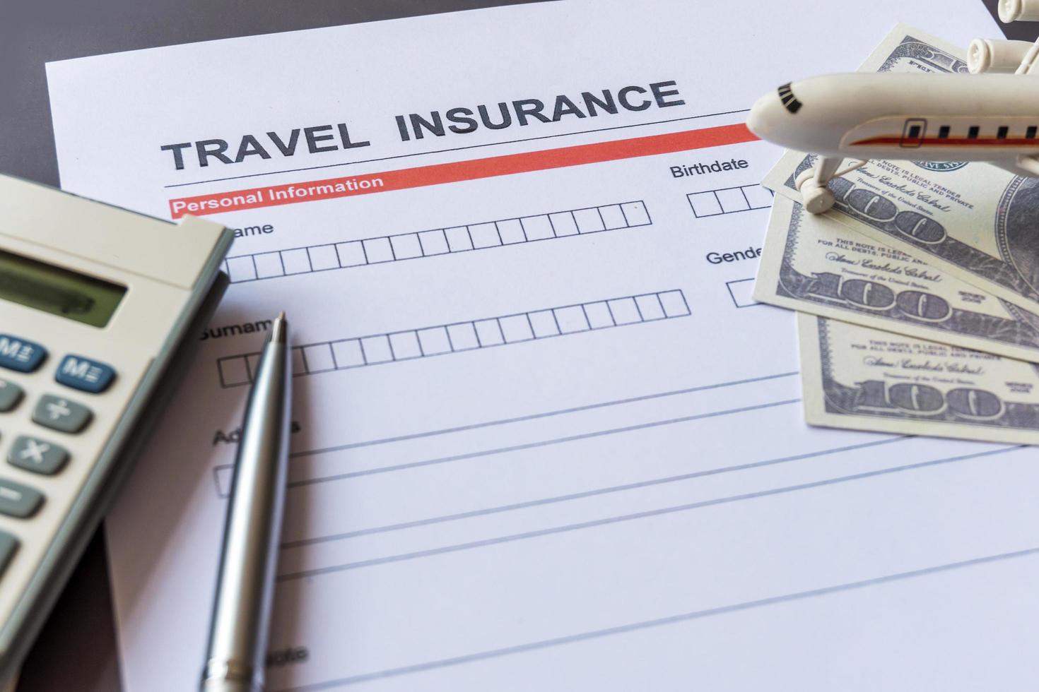 Travel  insurance form with model and policy document photo