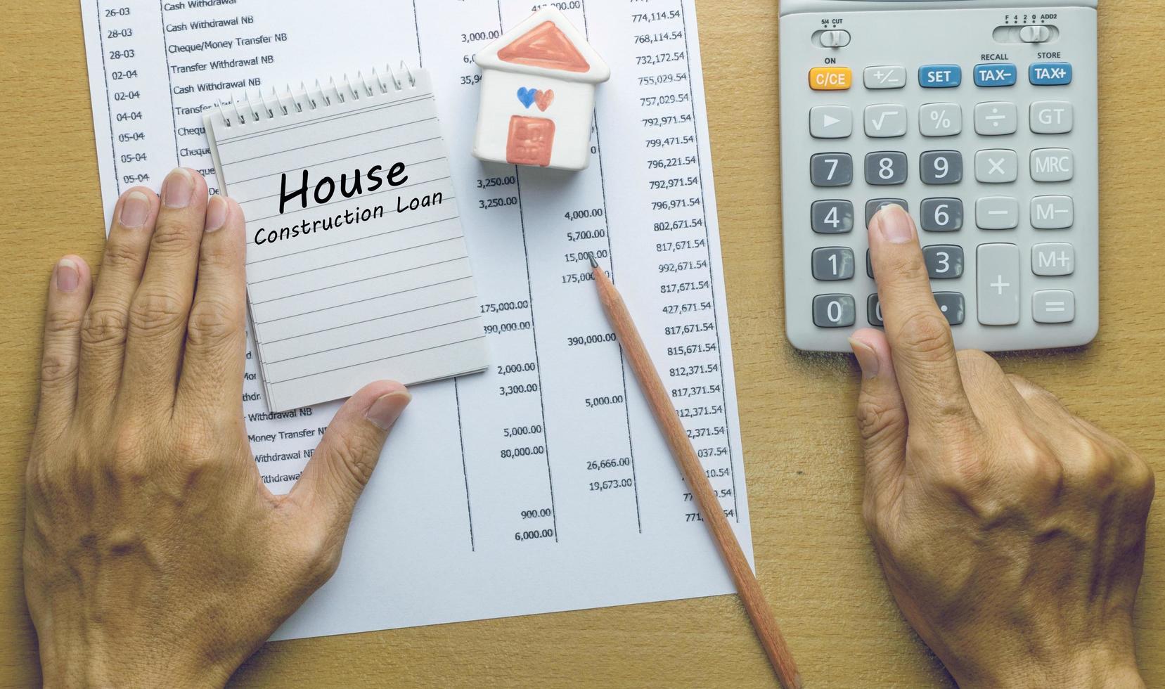 Man Planning monthly House construction loan photo