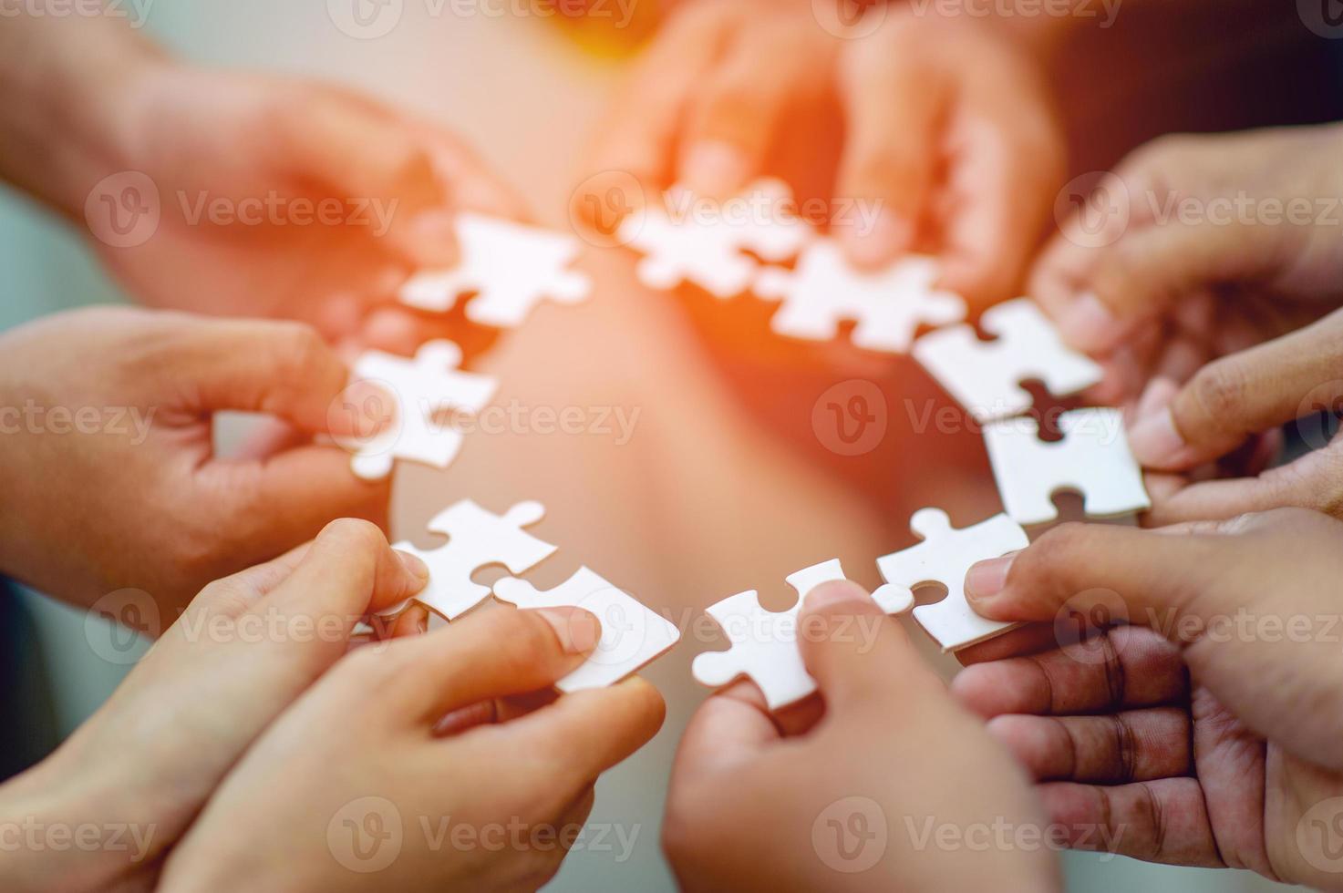 Team work, hands and jig Saw Unite with power Is a good team of successful people Team work concept photo