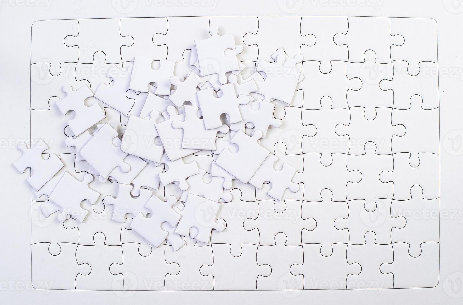 White jigsaw puzzles put together Business idea photo