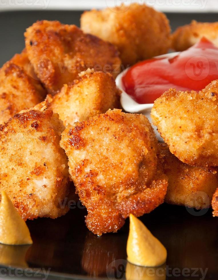 Fresh fragrant fried chicken nuggets photo