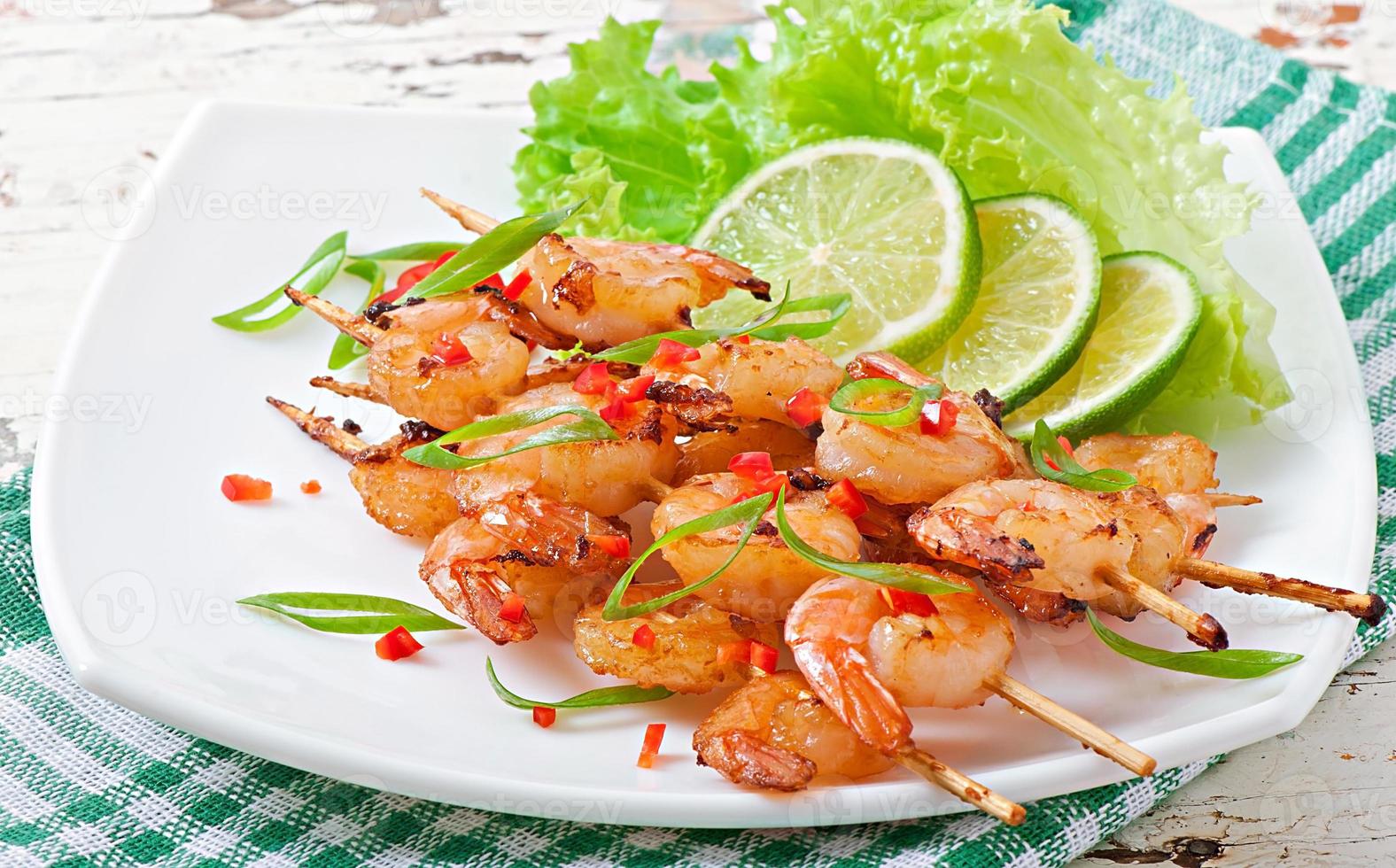 Shrimp sauteed in garlic and soy caramel photo