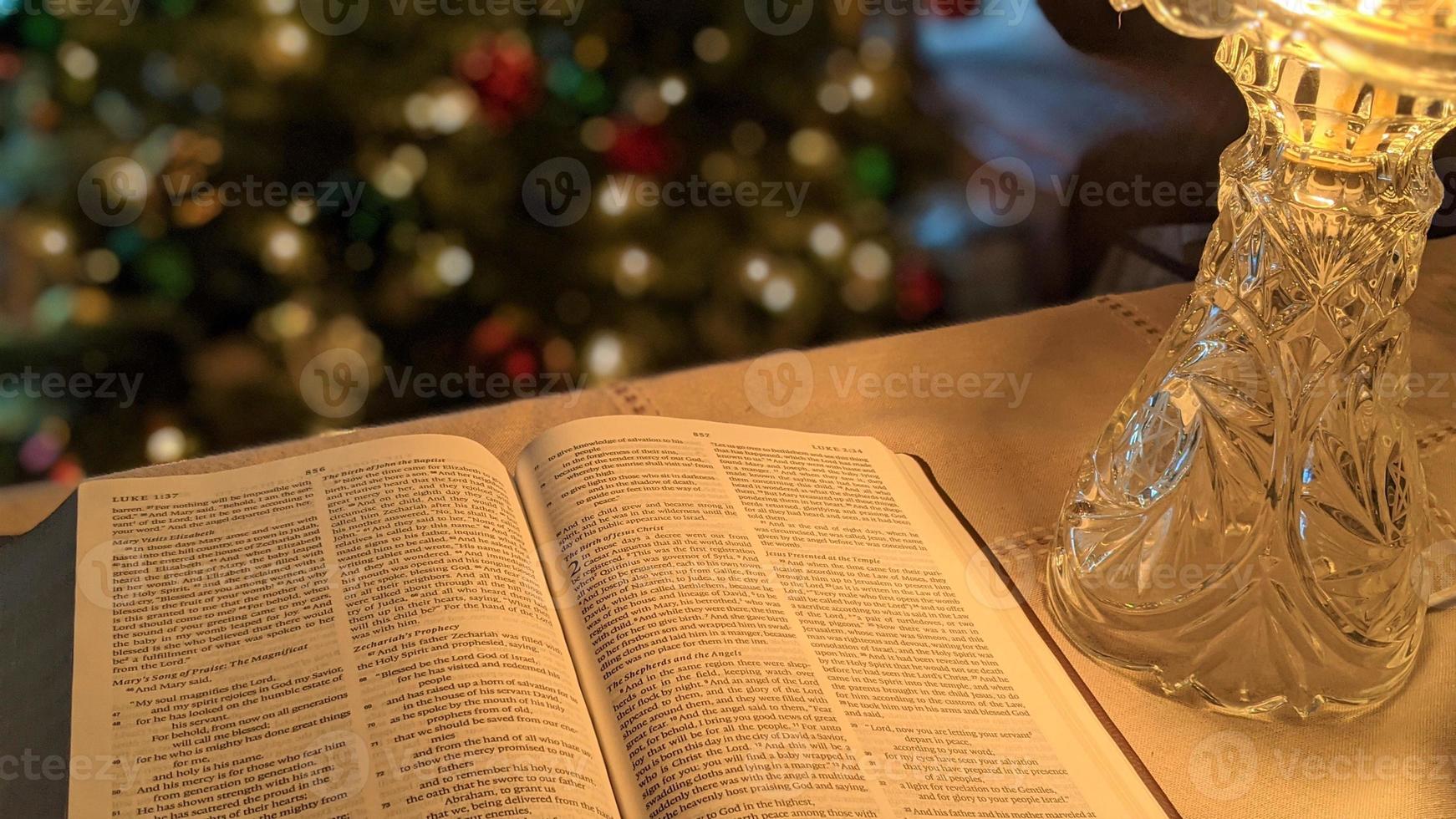 Reading Luke 2 at Christmas photo