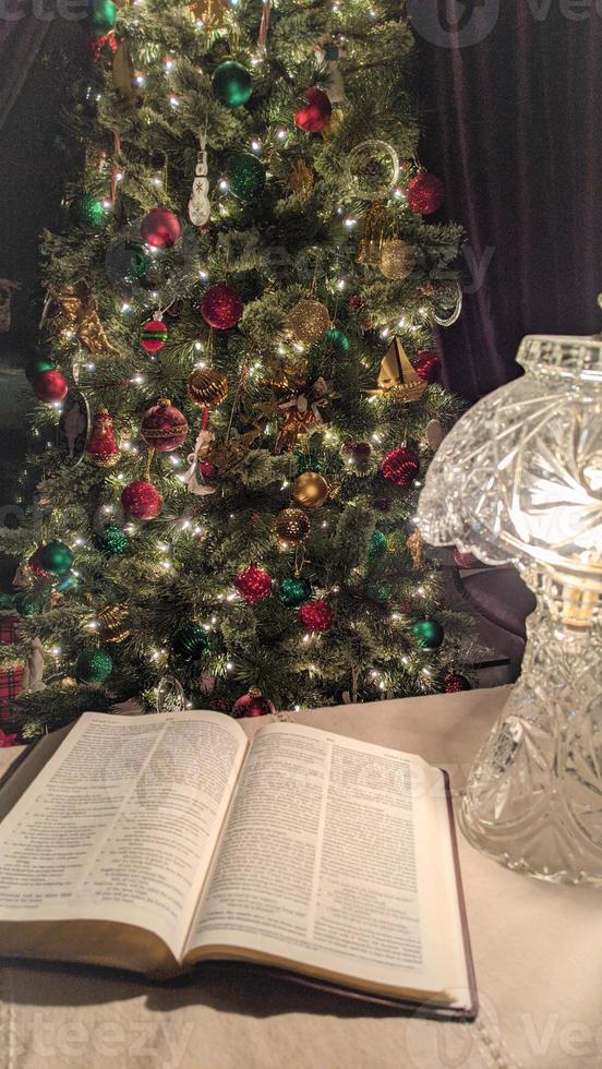 Reading Luke 2 By the Christmas Tree photo