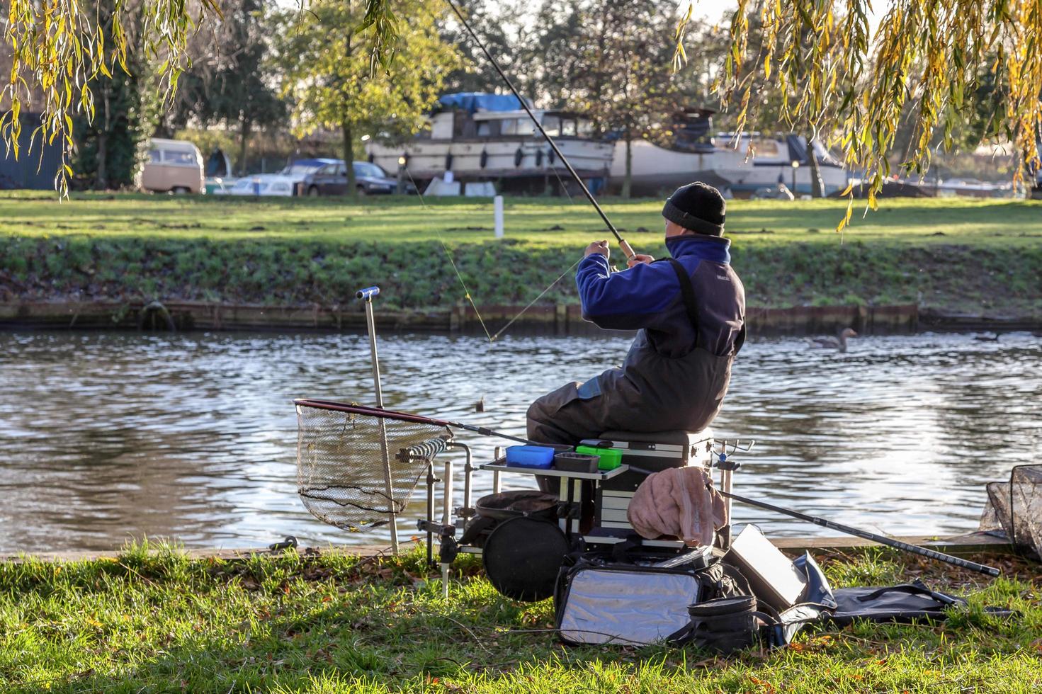 ELY, CAMBRIDGESHIRE, UK, 2012. Fishing the River Great Ouse photo