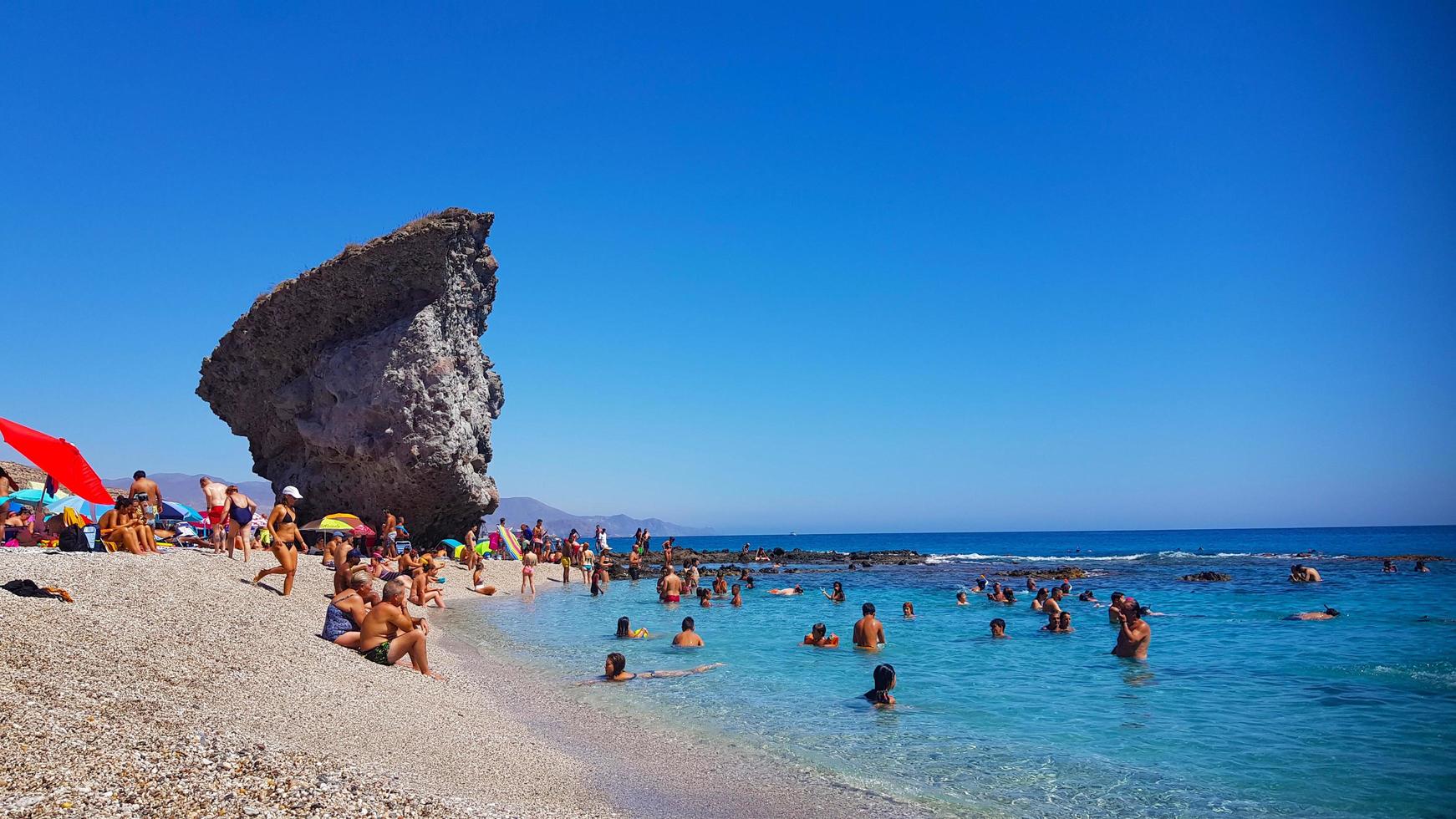 Almeria, Spain. 8-19-2019,  Vacation day at the Playa de los muertos photo