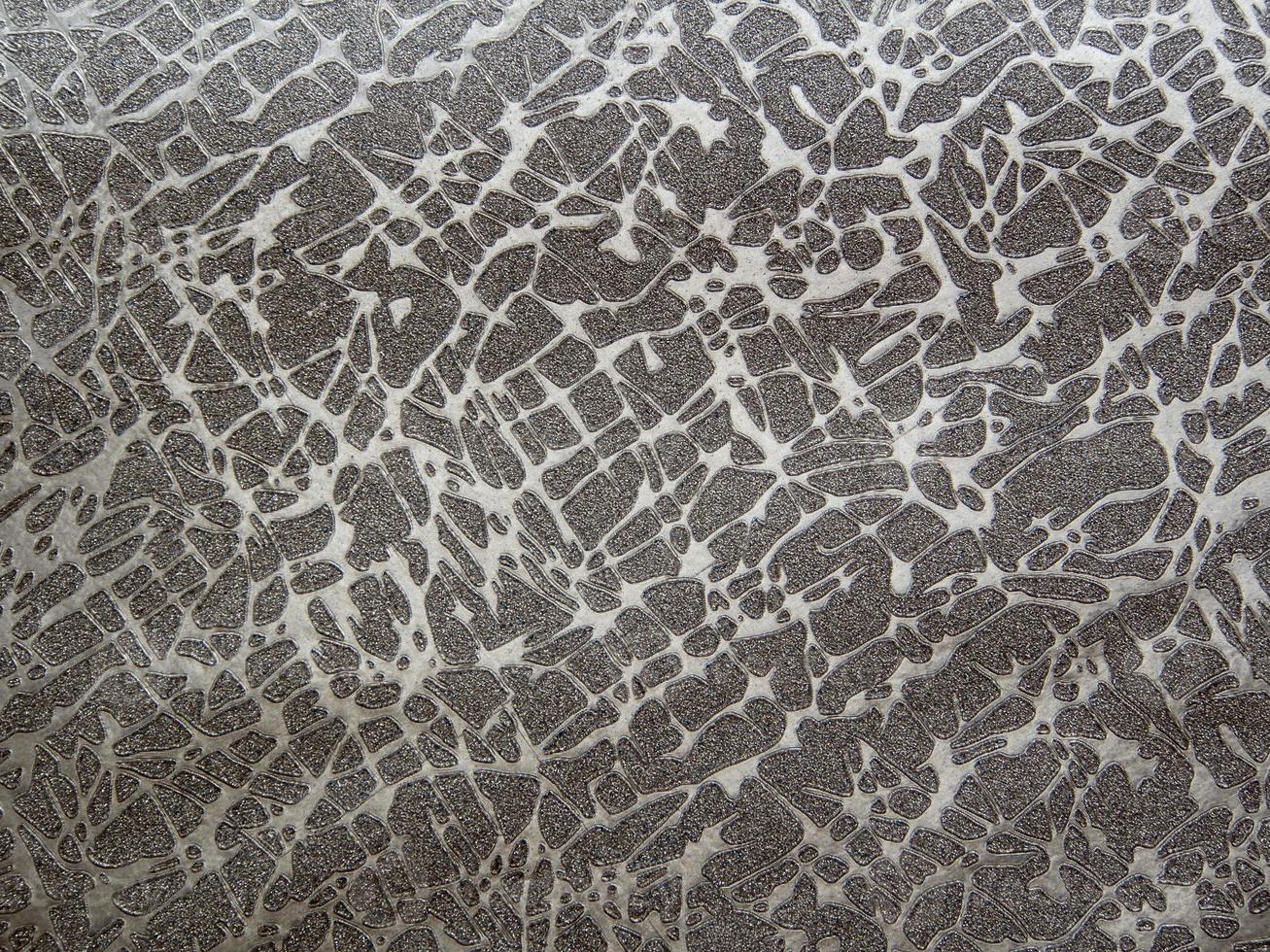 Shiny surface and pattern on foil paper texture for background photo