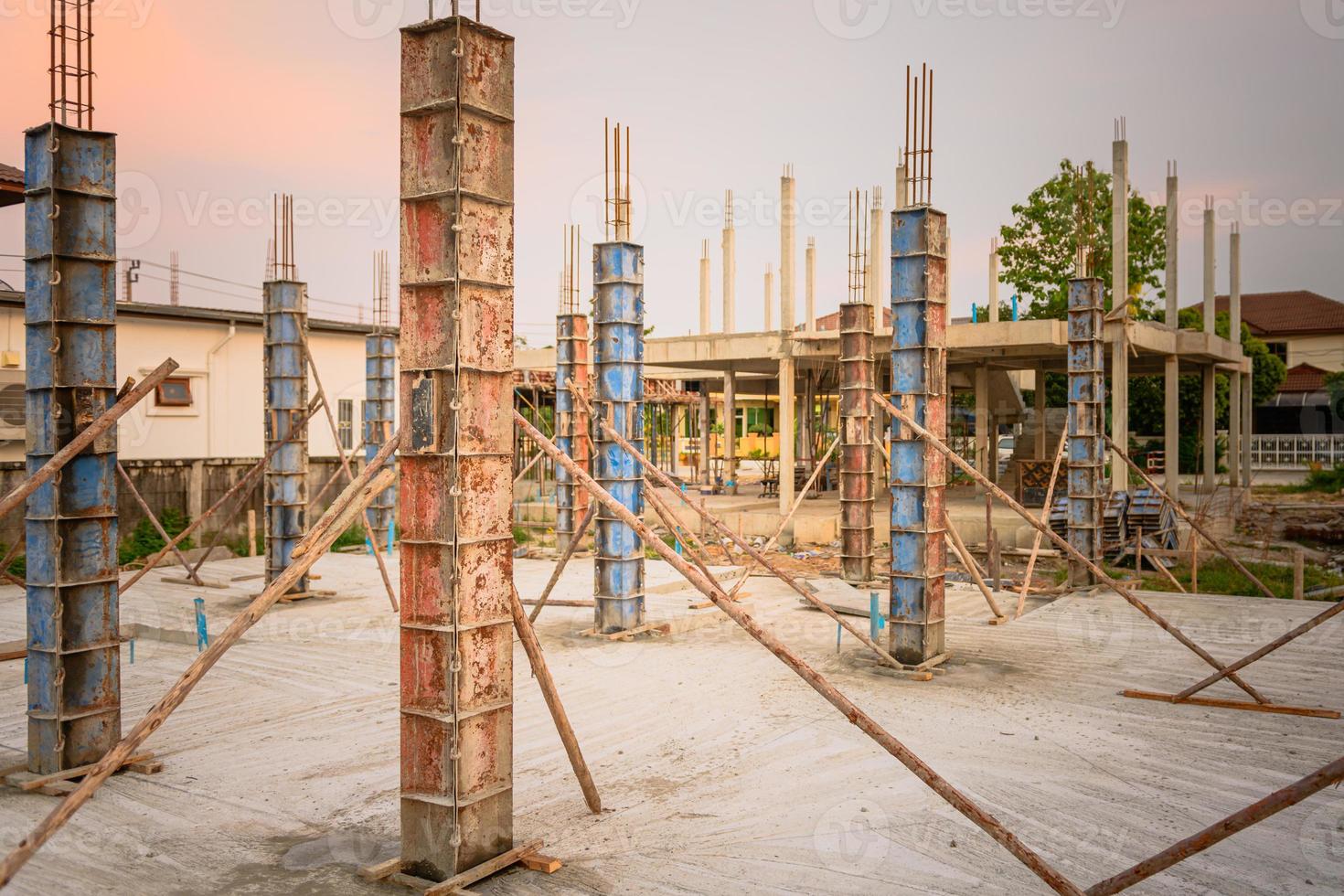 building process of a house column in construction site on housing project photo