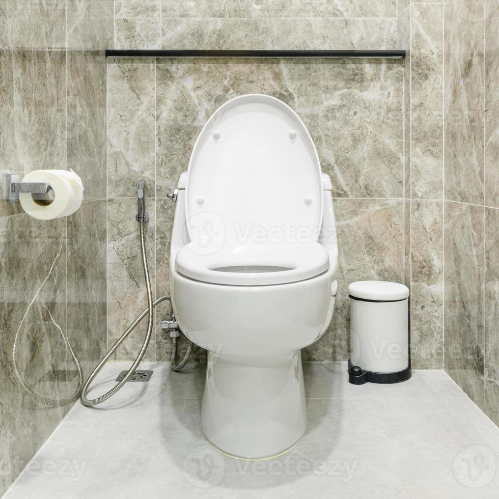 close up modern style interior design of a flush toilet in bathroom photo