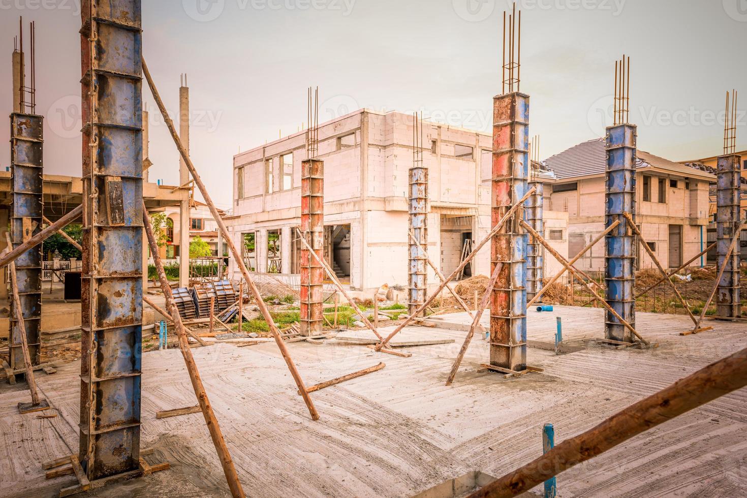 building process of a house column in construction site on housing project photo