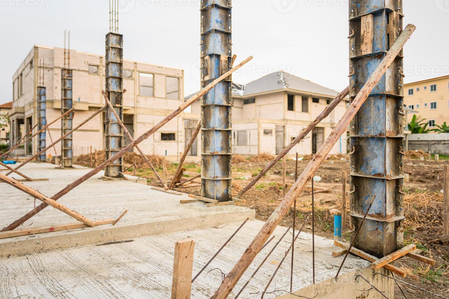 building process of a house column in construction site on housing project photo