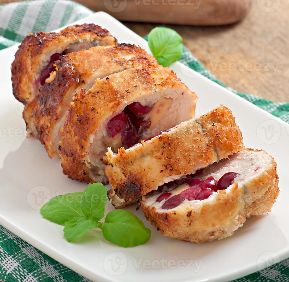 Chicken rolls with cranberries, cheese and honey photo