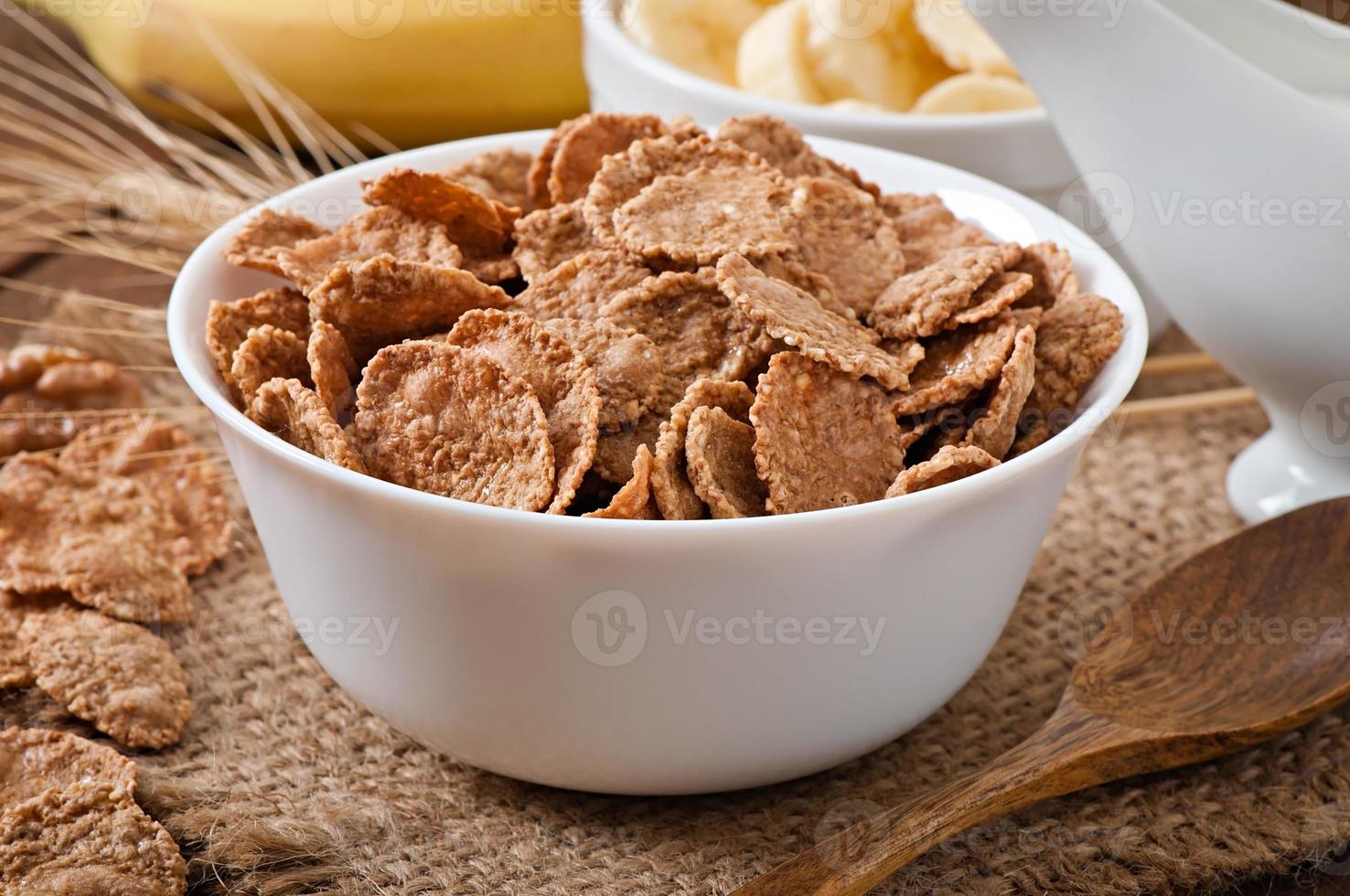 Healthy breakfast - whole grain muesli in a white bowl photo