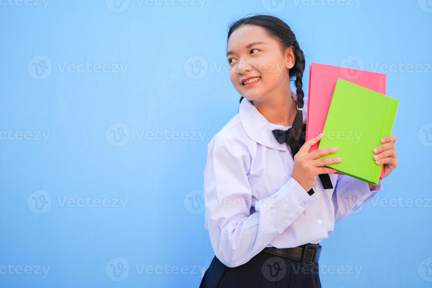 Happy school with book on blue background. photo