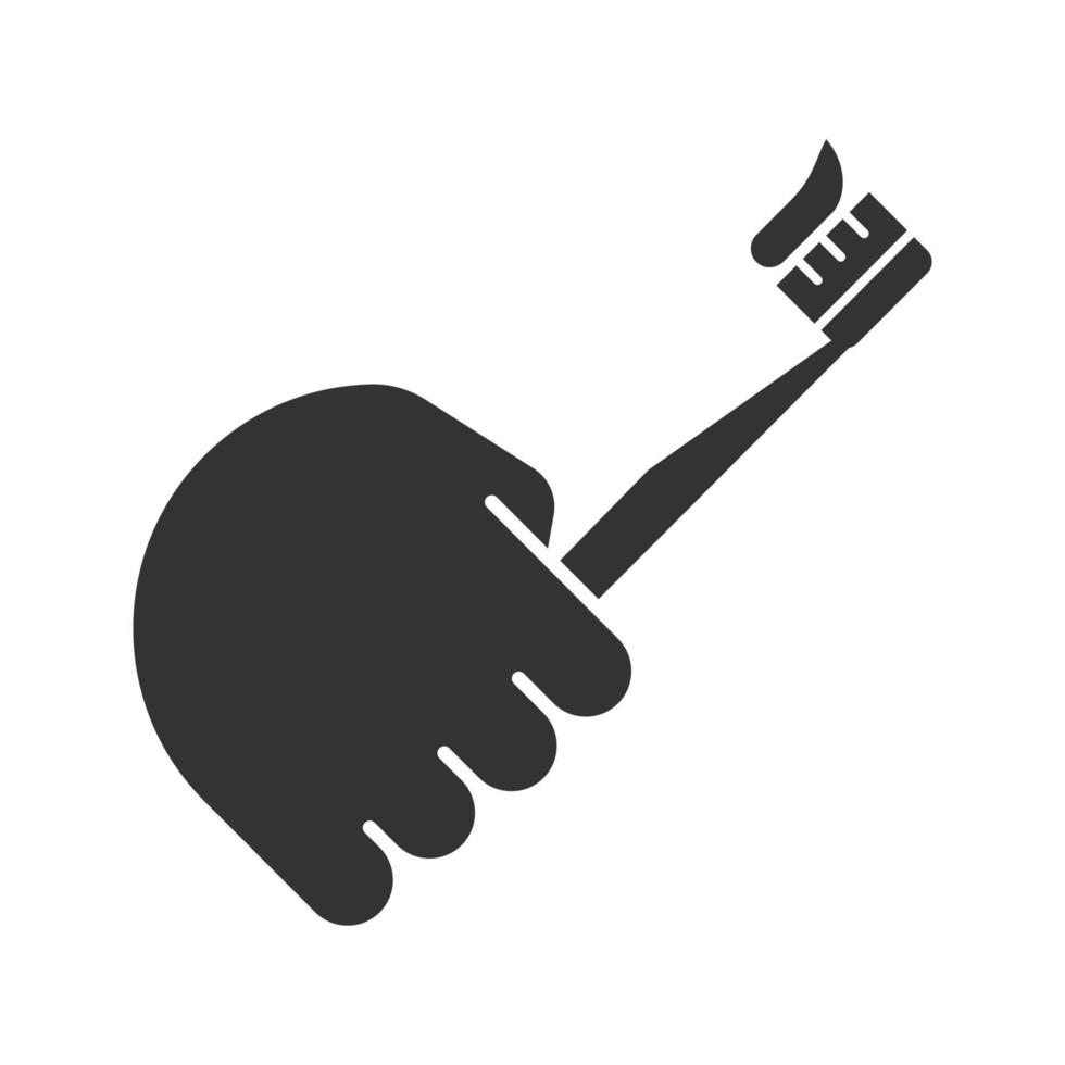 Hand holding toothbrush glyph icon. Silhouette symbol. Teeth cleaning. Negative space. Vector isolated illustration