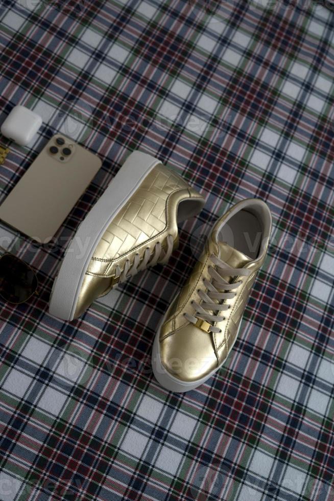 Gold women shoes and luxury modern accessories photo