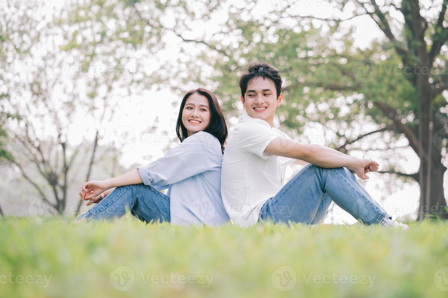 Portrait of young Asian couple outside photo