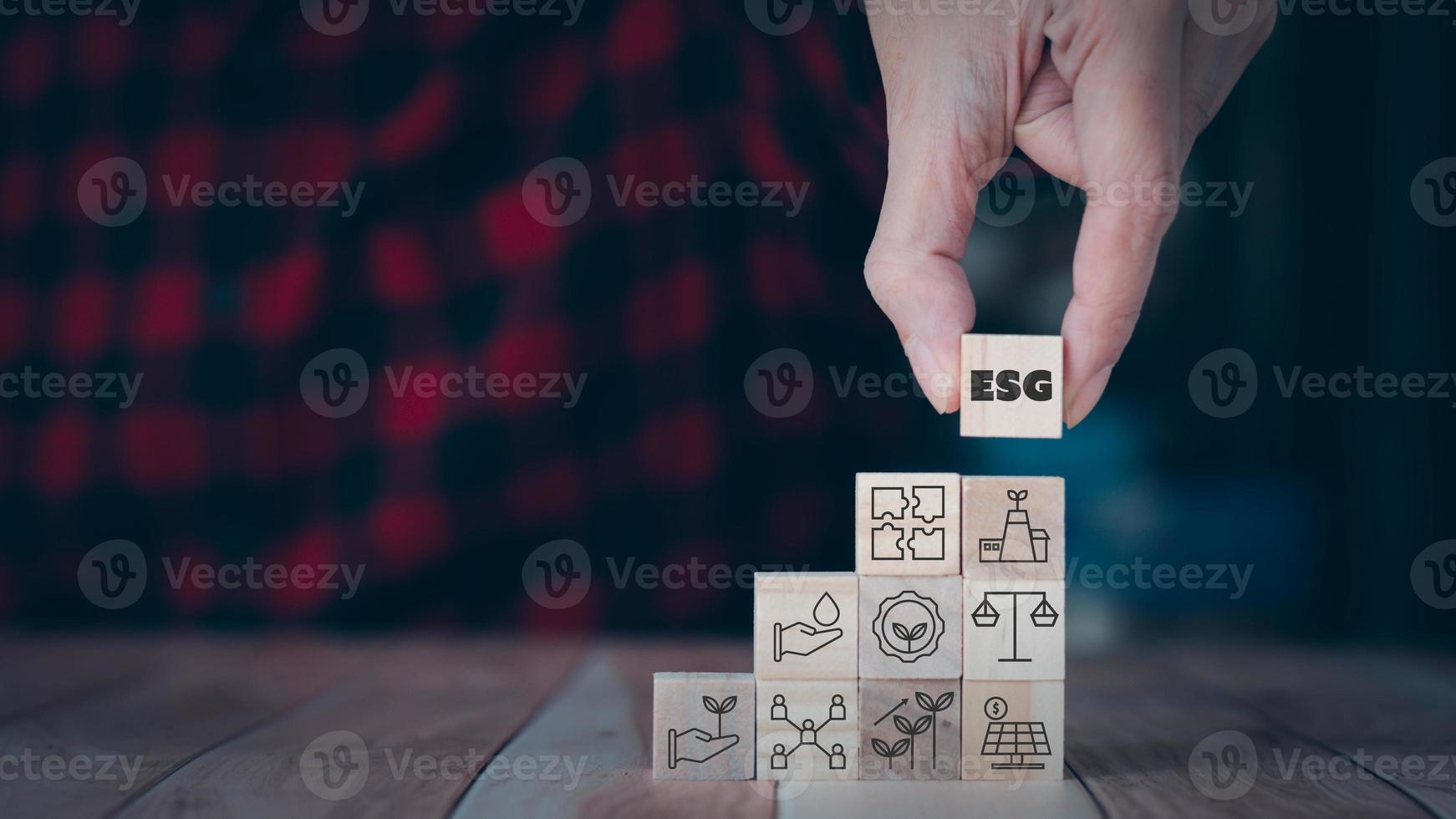 Set of environment social and governance ESG concept. The wooden block with thin line icons such as sustainable ecological, save water and energy, honest people. photo