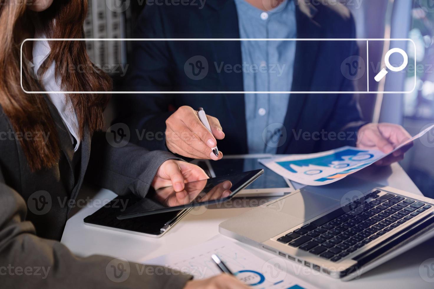Searching Browsing Internet Data Information Networking Concept. two businessman hand using smart phone,mobile and tablet photo
