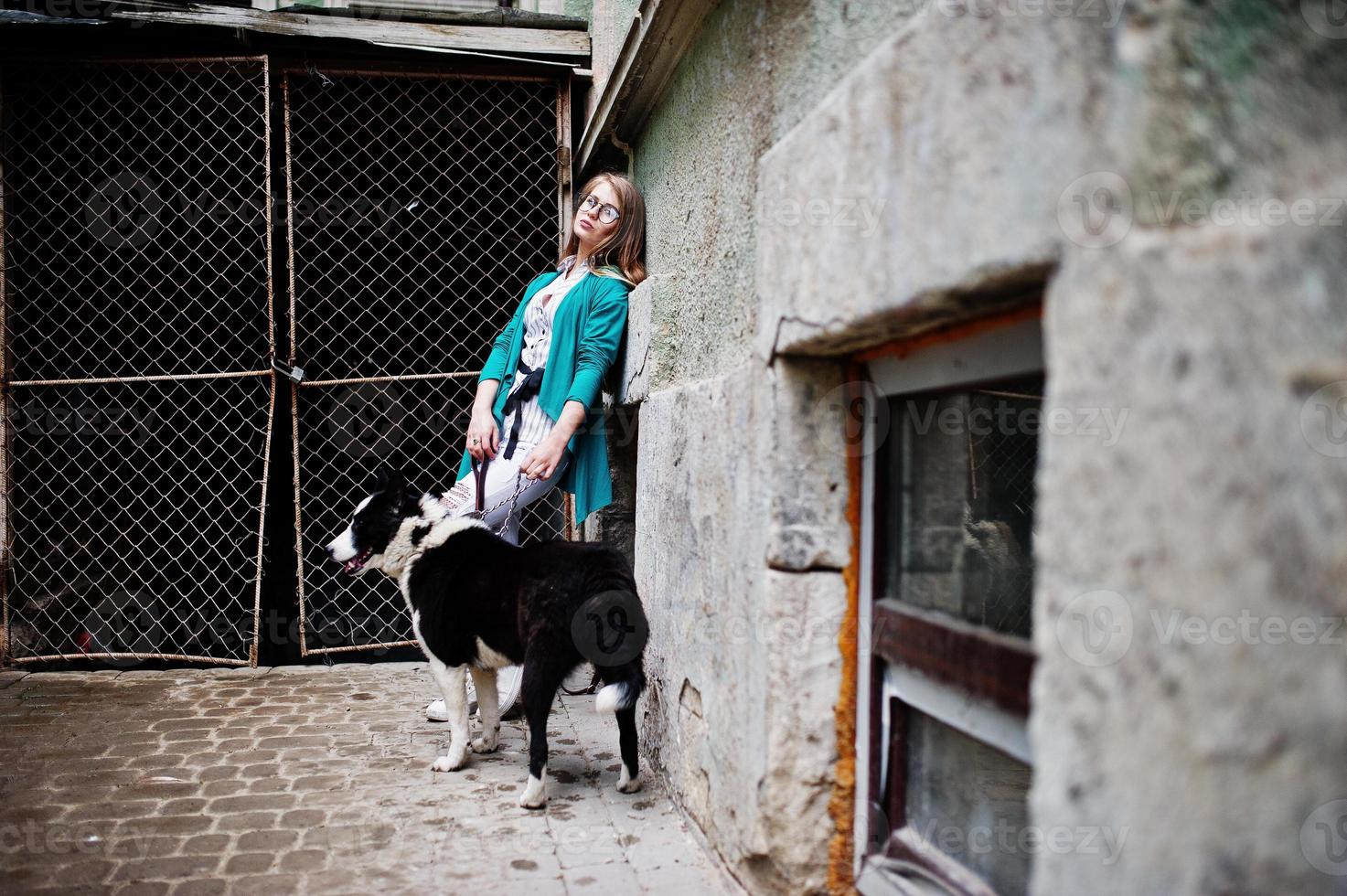 Trendy girl with laika husky dog photo