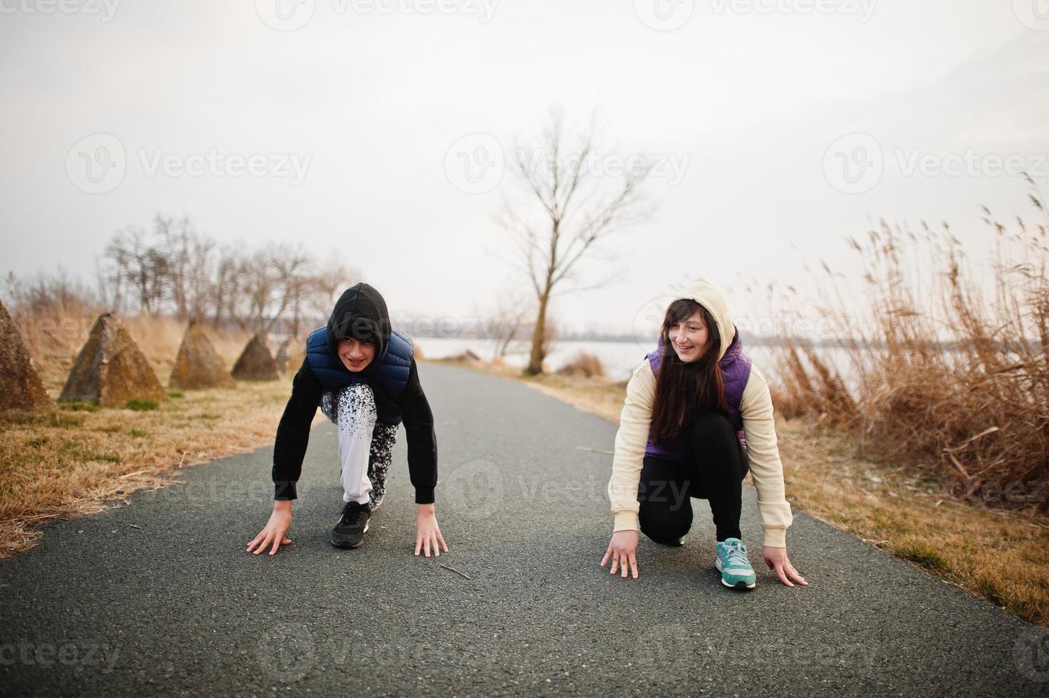 Mother with son getting ready for race. photo