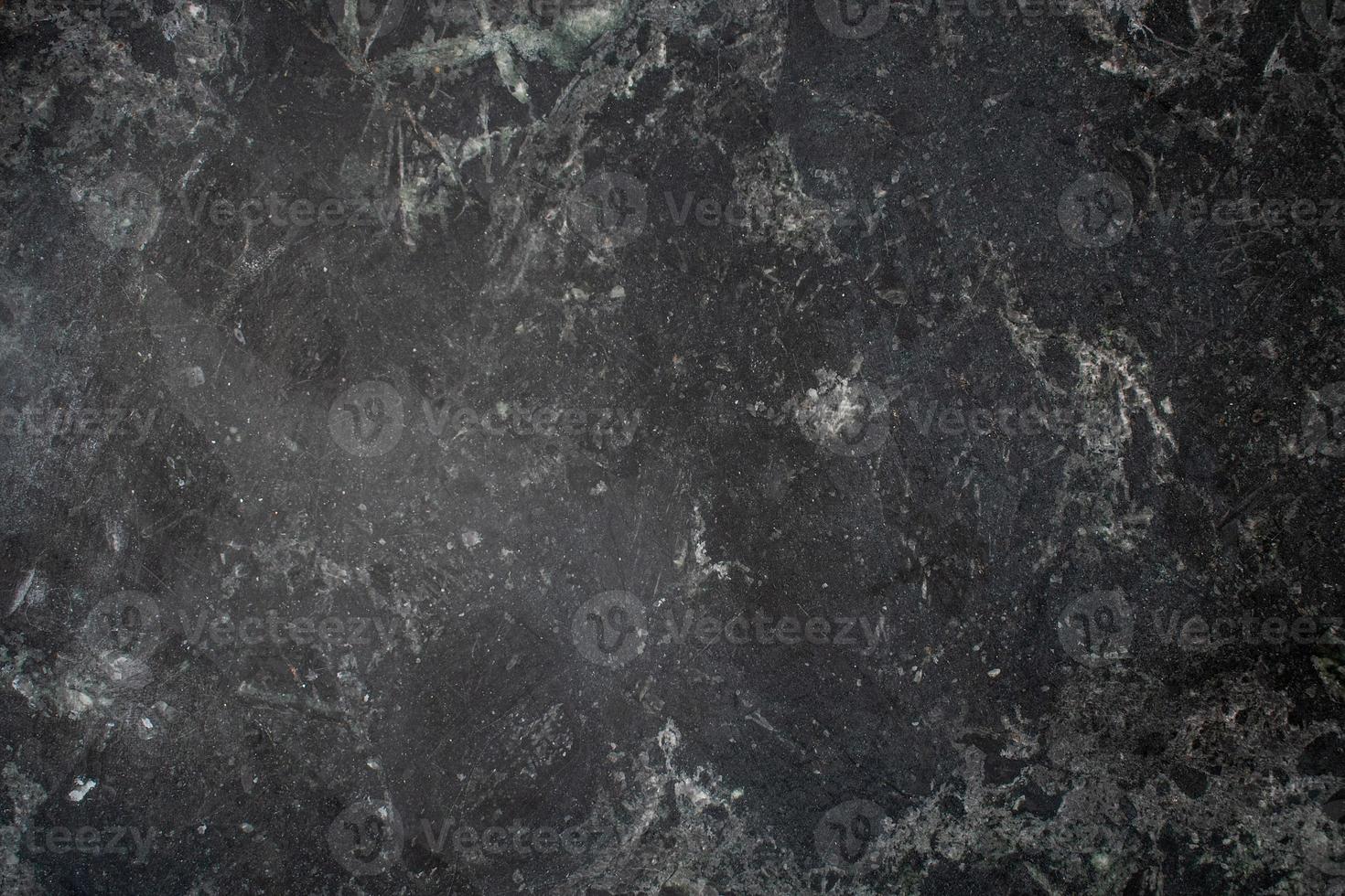 black marble with gray veining background texture photo