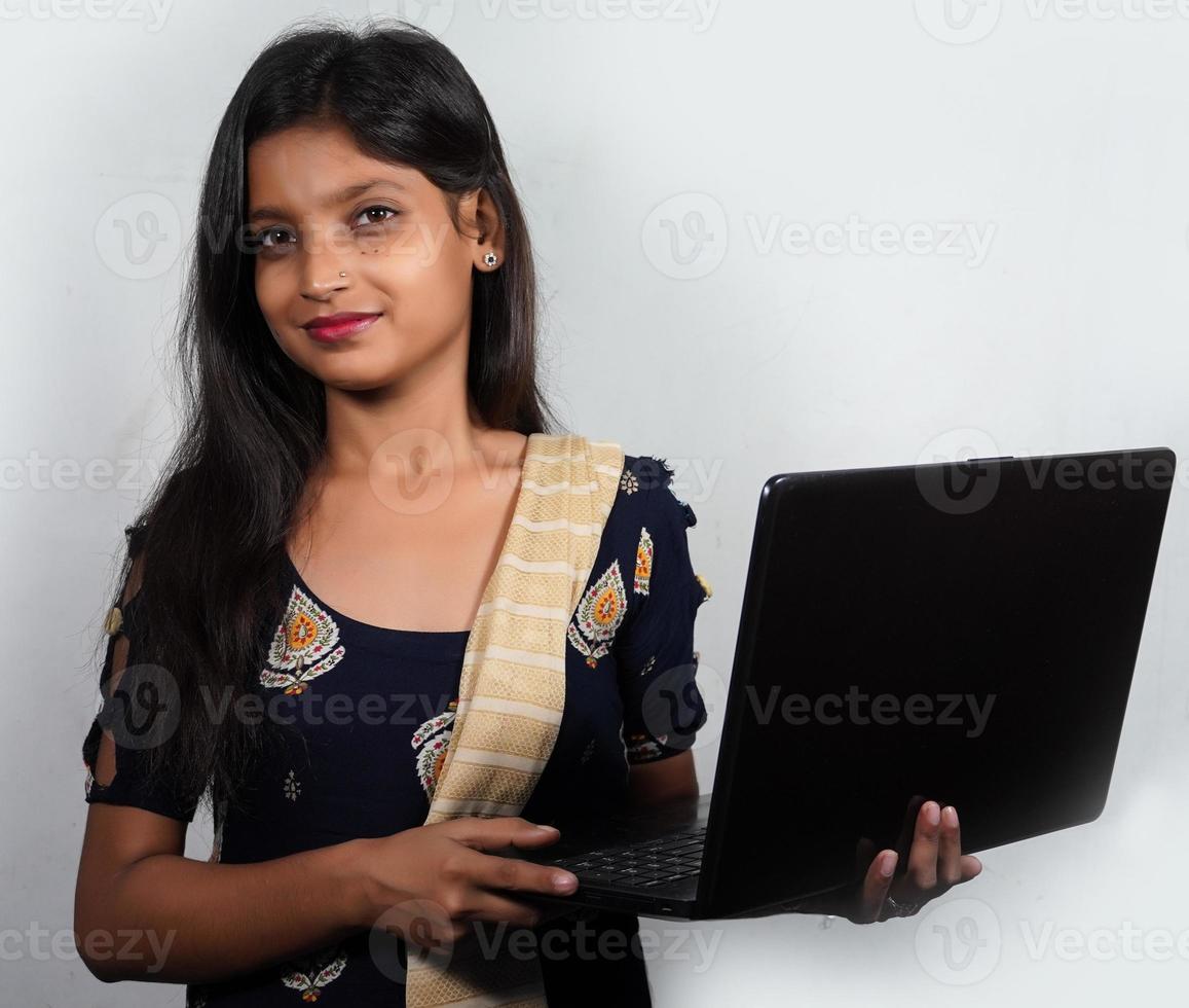 a indian girl with laptop photo