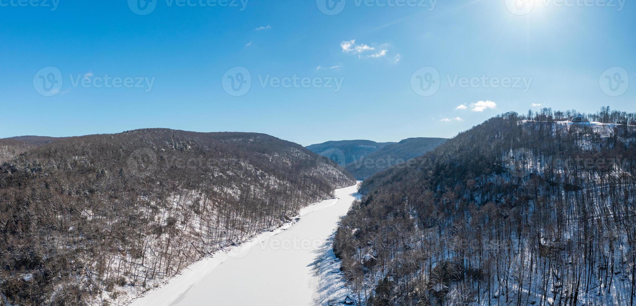 Aerial view up the frozen Cheat River in Morgantown, WV photo