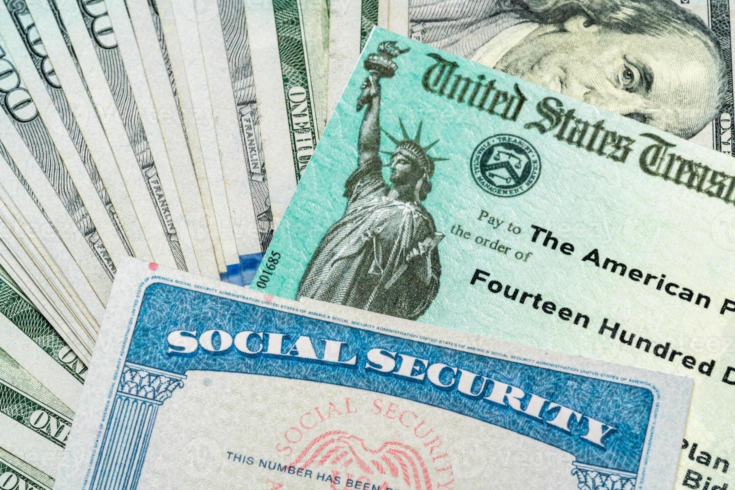 Illustration of the 2021 federal stimulus check from the IRS with cash and social security card photo