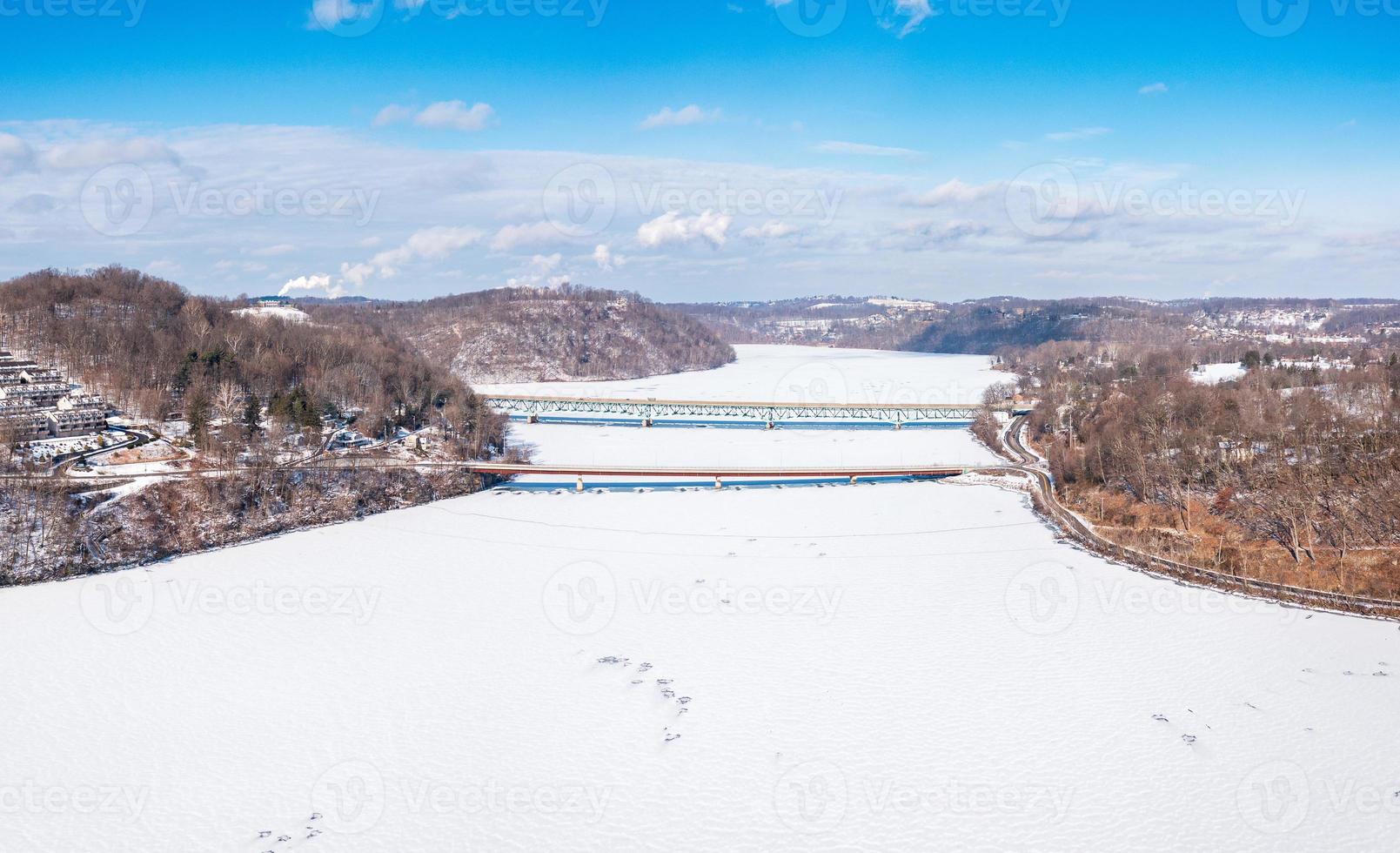 Aerial panorama of the frozen Cheat Lake Morgantown, WV with I68 bridge photo