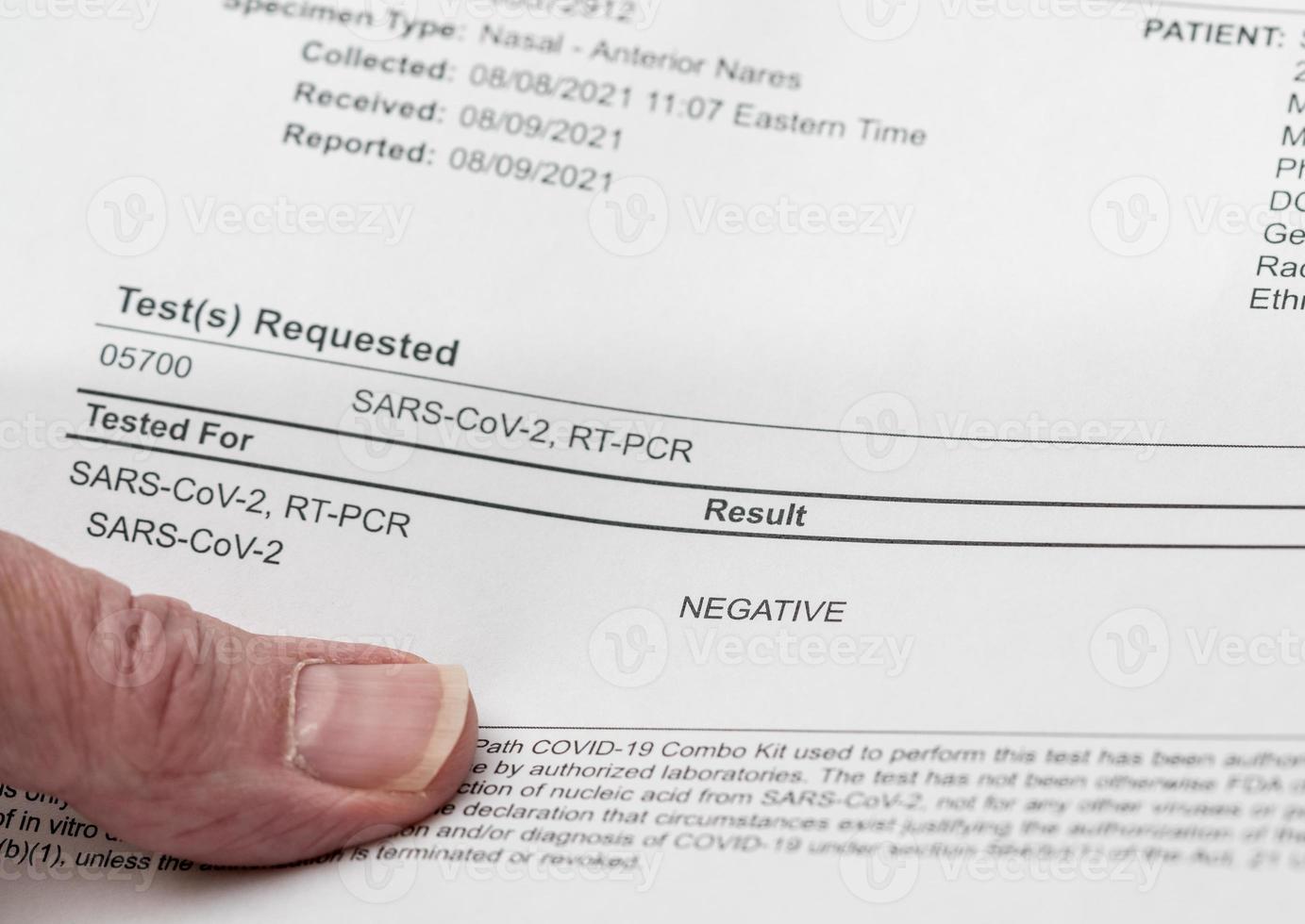 Printout showing result of PCR test for Covid-19 as negative photo