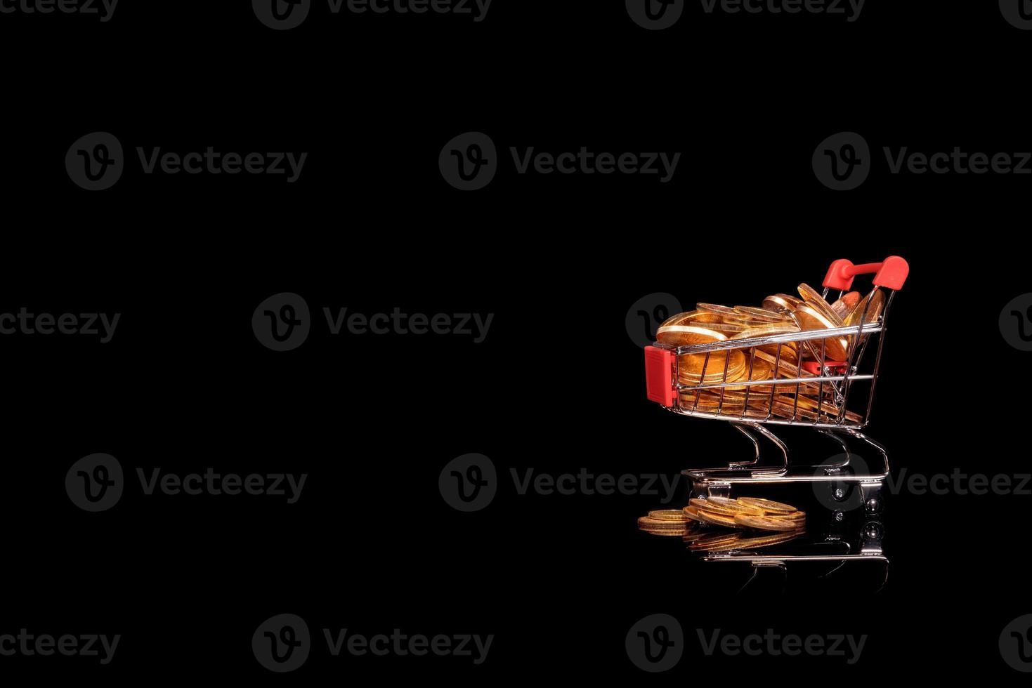 Sale mockup or background with shopping cart filled with gold coins photo