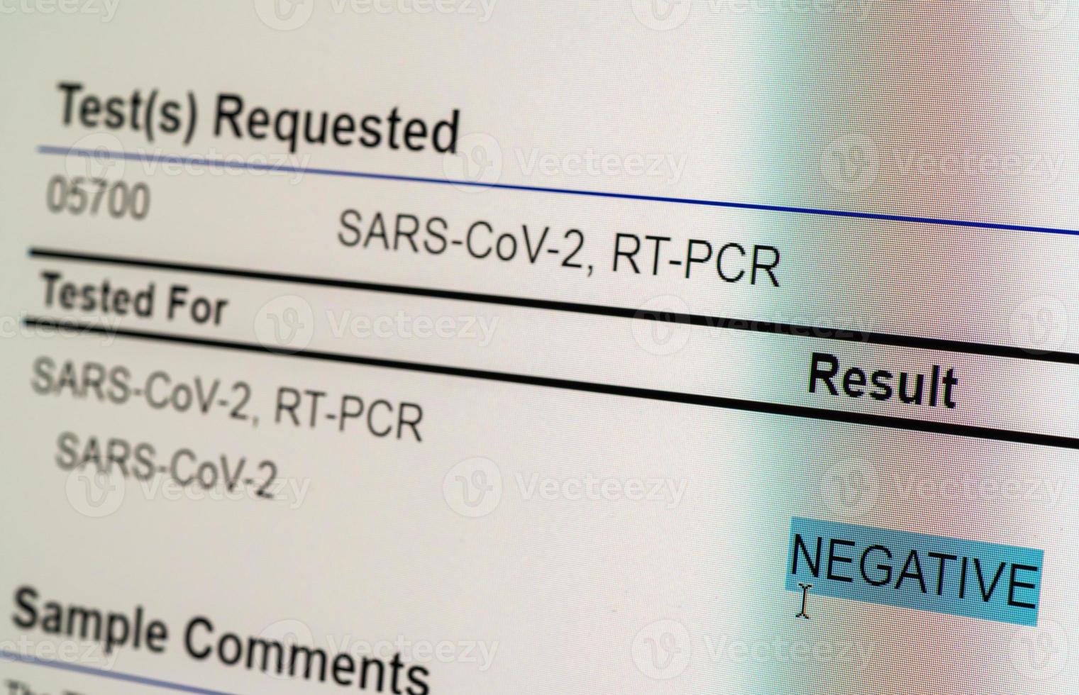 View of computer screen showing result of PCR test for Covid-19 as negative photo