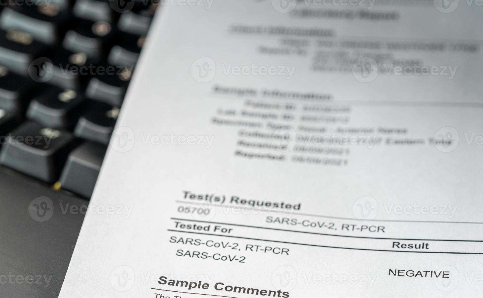 Printout showing result of PCR test for Covid-19 as negative photo